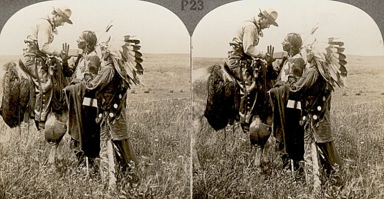 Indians talking to cowboy in sign language