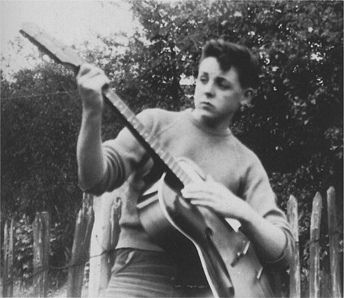 Paul McCartney with his first guitar