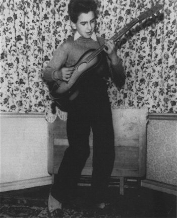 George Harrison with his first guitar