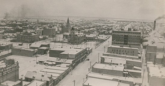 Looking south on 9 st. ~ St. Pauls Church ~ City Hall ~ Prince Edward Hotel ~ Hydro Chimney circa 1918