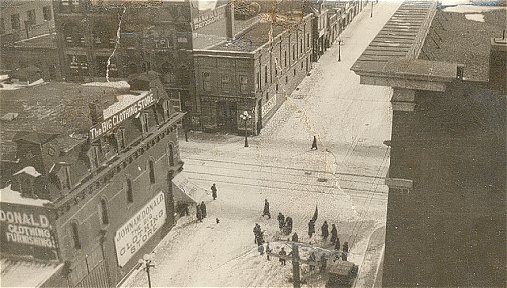 9th and Rosser south: McDonald Clothing and Johnston's Hardware on SE corner