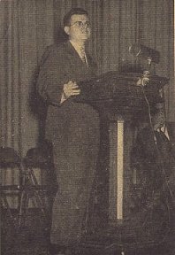 Rev. Robert Brockway of Northport presiding during the question period after a U.N. Forum