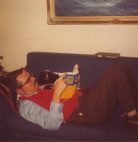 Robert at home, with pet skunk, Skippy - 1973