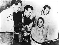 Johnny Cash (r) with Jerry Lee, Carl, Elvis in Sun Studios