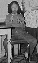 Sue-On and Mom taking kitchen break: circa 1960