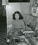 Sue-On taking a break at the Paris Cafe magazine rack