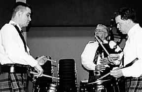 Don Roy pipes for Sean Osztian(left)and Tom Connon