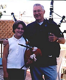 My cousin John`s Grand daughter Ellen in Stellarton NS   (Real good piper)