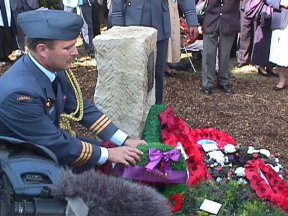 [11] Col. Mason Placing a Wreath at the Memorial