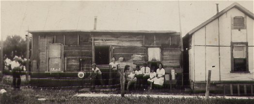 Mundryk house, Elm Creek: Mr. M, Rudy, Mike, Mrs. M and Fanny, Andy, father, Nellie, mother