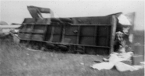 Unweildy Fed Grain trailer rolled and demolished somewhere in Saskatchewan