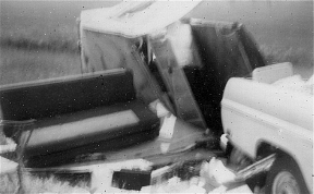 Unweildy Fed Grain trailer rolled and demolished somewhere in Saskatchewan