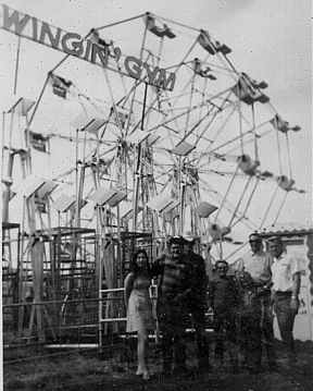 Band with carnies and Chuck's Ferris wheel