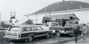 Replacement trailer (after accident), truck, Barry's station wagon, Hillman tent trailer set up on fairgrounds