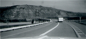 Following behind band trailer approching bridge over Peace River