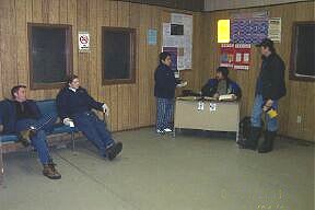 Puk Terminal: pilots left ~ Gordon Caribou at desk ~ passengers to Thompson