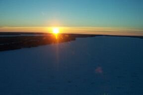 5:30 sunset during 45 minute flight north to Pukatawagan