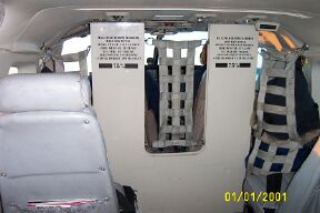 Pilots' cockpit with eight passenger seats behind
