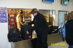 Retrieving luggage at The Pas