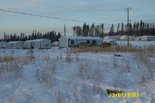 Approaching house trailers in Capone area