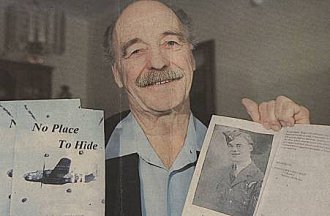 George Olson  with copy of No Place to Hide