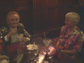 [9] Louise Hillman and Mrs. Selby Chat Over Dessert