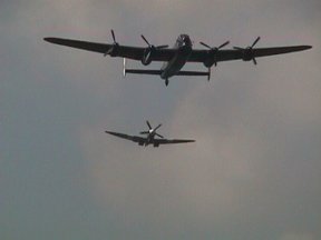 [5] Lancaster and Spitfire Make Their Approach: Battle of Britain Memorial Flight (BBMF) AVRO Lancaster Bomber