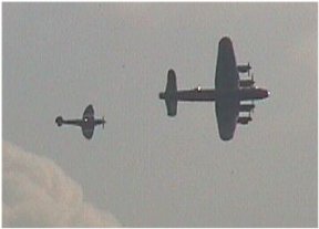 [6] Lancaster and Spitfire Bank in Formation