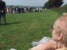 [3] Louise Hillman (Sister of the Pilot) Overlooks the Crowd Assembled at the Crash Site
