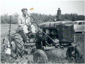 Dad Doing Land Work On The Home Front