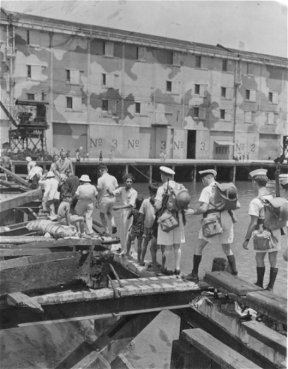 Platoon sending Chinese back across damaged bridge, Kowloon