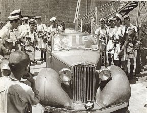 Landing party taking Japanese officers and car into custody