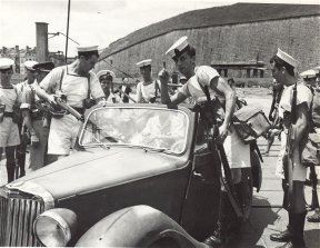 Landing party taking Japanese officers and car into custody