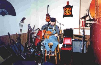 Poor Boy Rodger and his many guitars