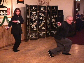 Bonnie and Vaughn demonstrating a Tai Chi form in main showhall