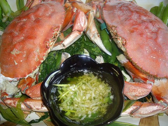 Lying on a bed of steamed Chinese broccoli