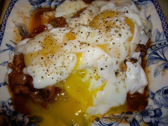 Poached eggs over turkey chili