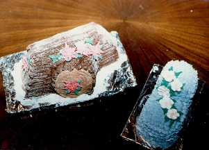 Yule Log with Poinsettas and Baby Boot with Apple Blossoms