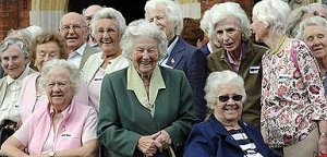 Mavis Batey, in green, a code-breaker who worked on the Enigma machine with fellow Bletchley veterans