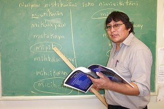 Robert Castel teaching Cree in his Pukatawagan classroom
